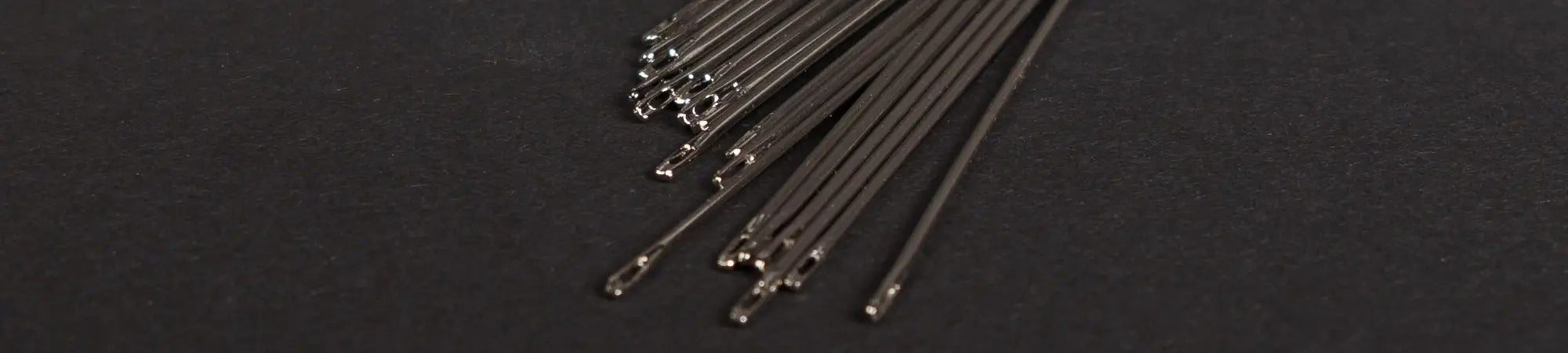 Stitching needles